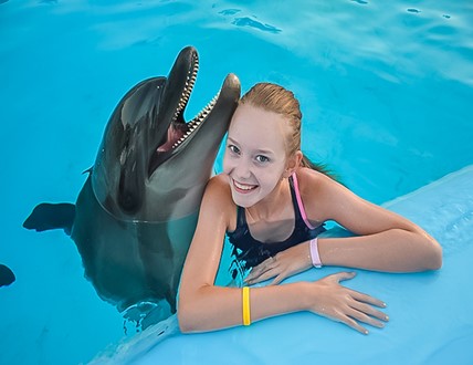 PHOTOS WITH DOLPHIN INSIDE THE POOL